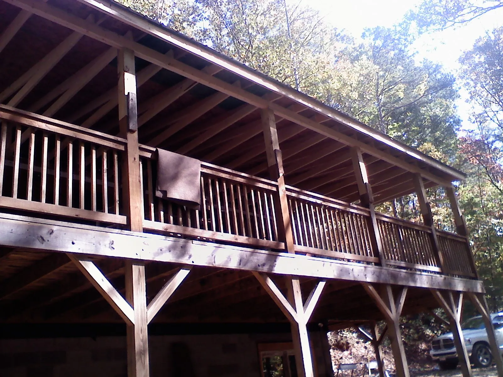 Timber framing under a new elevated porch and deck — Roof Leak Repair in Nisswa by Roofing Brothers
